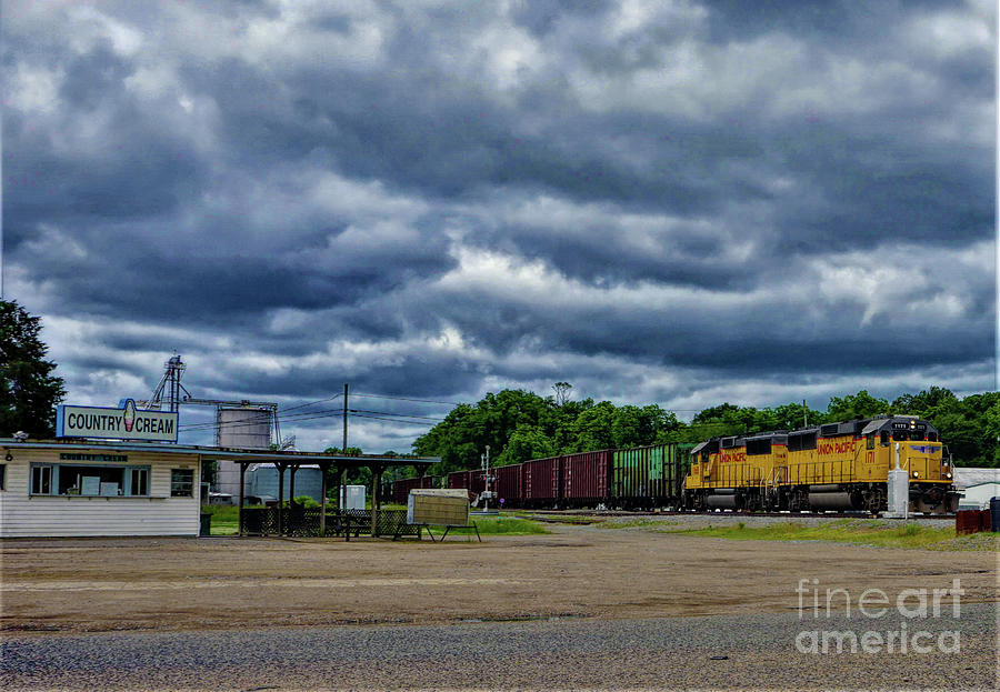 Approaching Train, Approaching Storm Photograph by Karen Beasley
