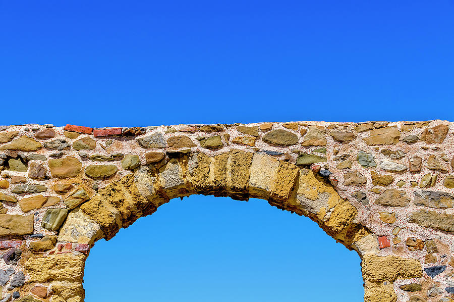Arch and blue sky cefalu Sicily Photograph by Xavier Cardell