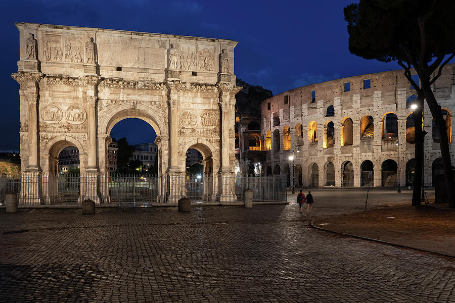 Architecture Photograph - Arch of Constantine and Colosseum by Night in Rome by Artur Bogacki
