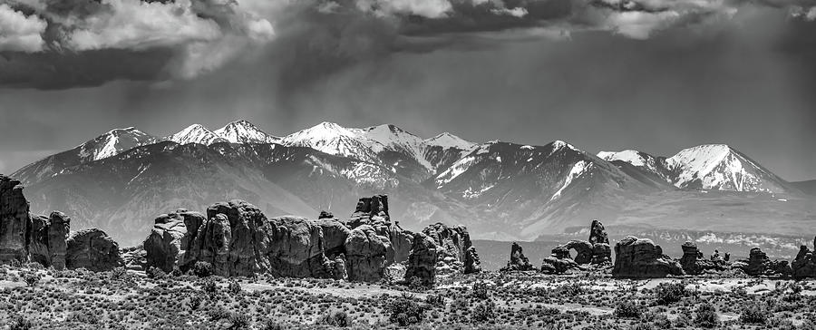 Arches National Park and La Sal Mountain Landscape Panorama - Black and White Photograph by Gregory Ballos