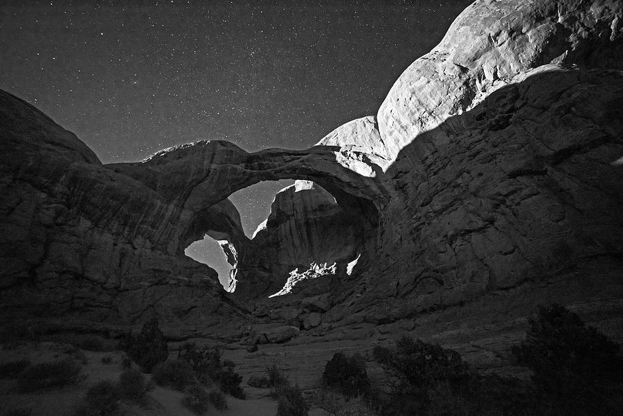 Arches National Park Double Arch in the Moonlight Moab Utah Black and White Photograph by Toby McGuire