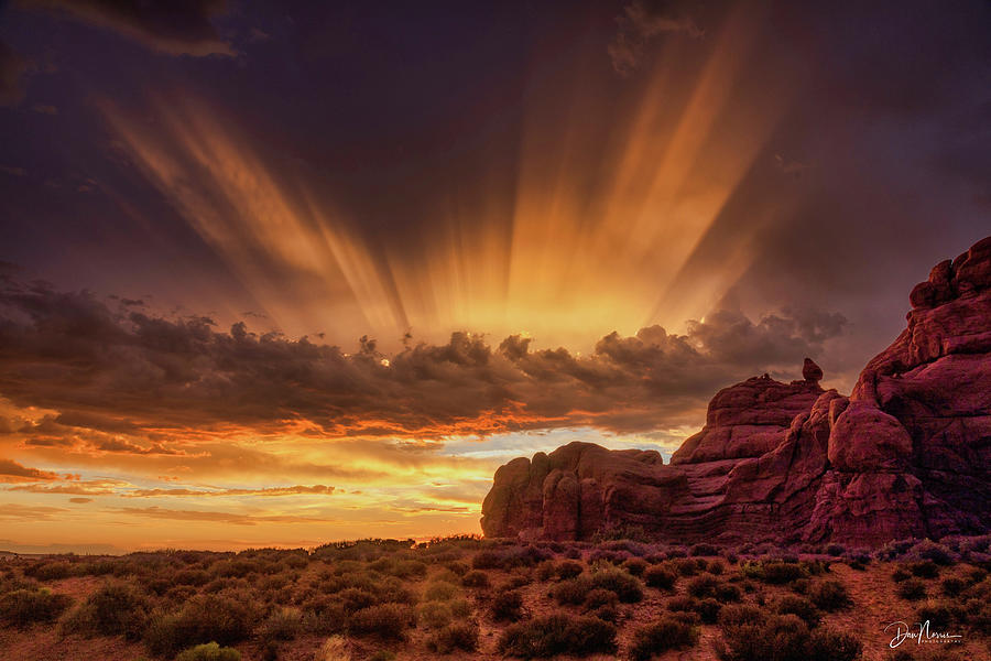 Arches Sunset Crepuscular Rays Photograph by Dan Norris