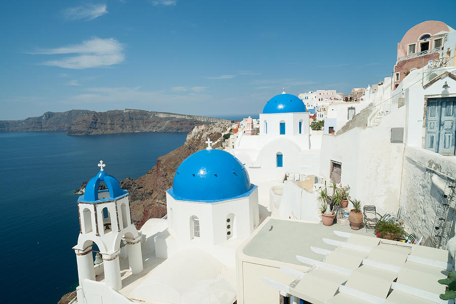 Architecture Blue cross on the church roof in Fira on Santorini island, Greece. Photograph by Skaman306