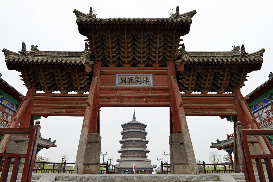 Archway and wooden tower Photograph by Yue Wang