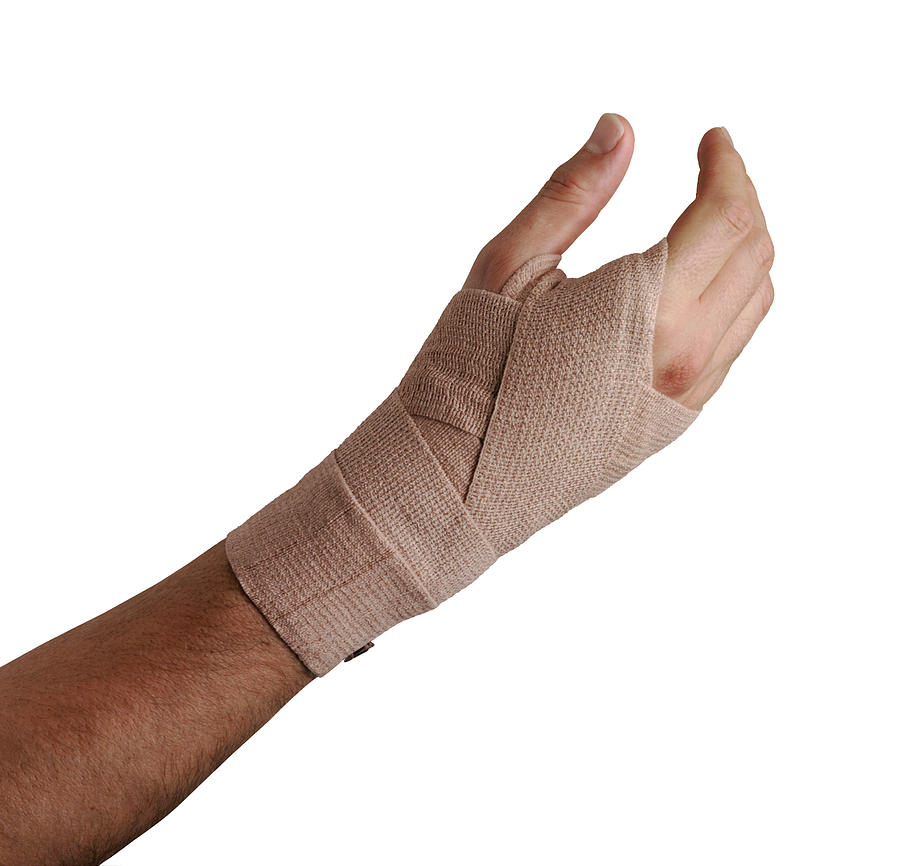 Arm with elastic cloth bandage Photograph by Brand X Pictures