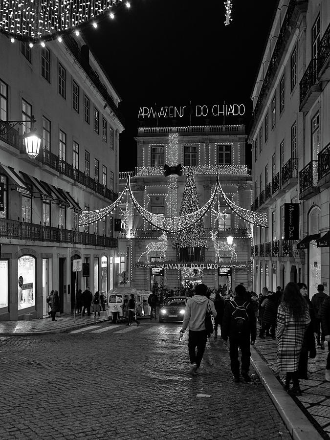 Armazens do Chiado at night in Lisbon Photograph by Angelo DeVal
