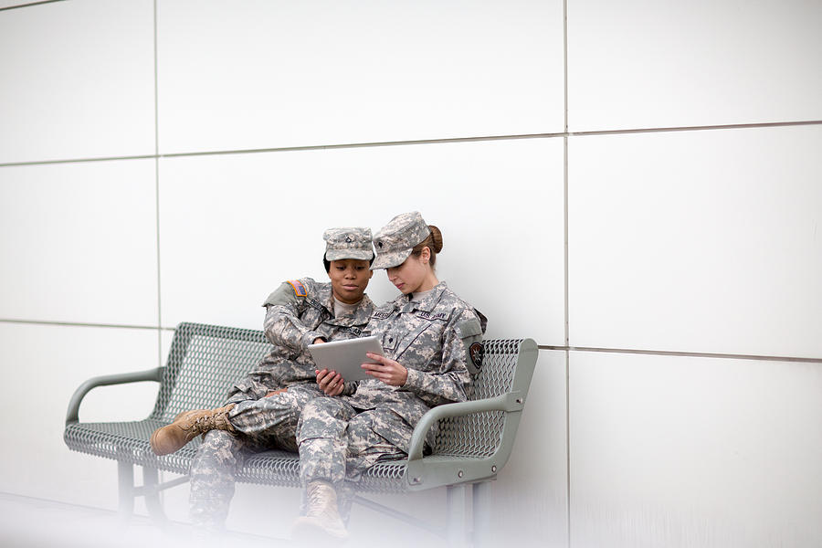 Army Soldier Women Looking at Tablet Photograph by Sean Murphy