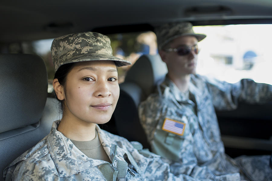 Army Woman and Man in Car Photograph by Catherine Ledner