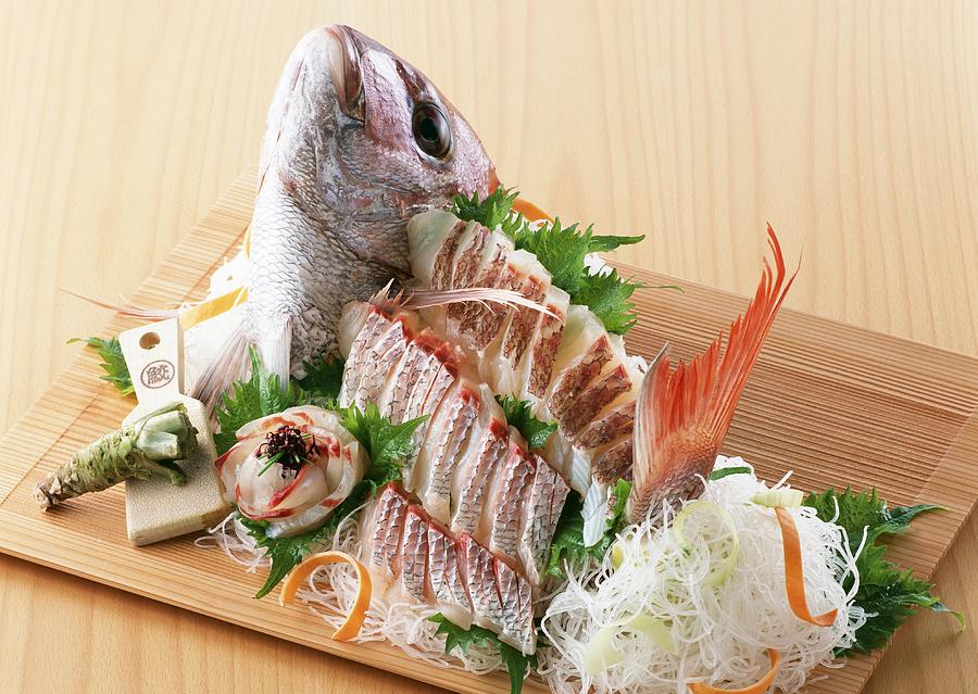 Arranged sea bream sashimi Photograph by Imagenavi