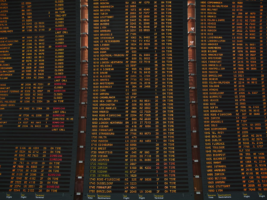 Arrivals and Departures Timetable inside the Charles de Gaulle airport in Paris Photograph by Busà Photography