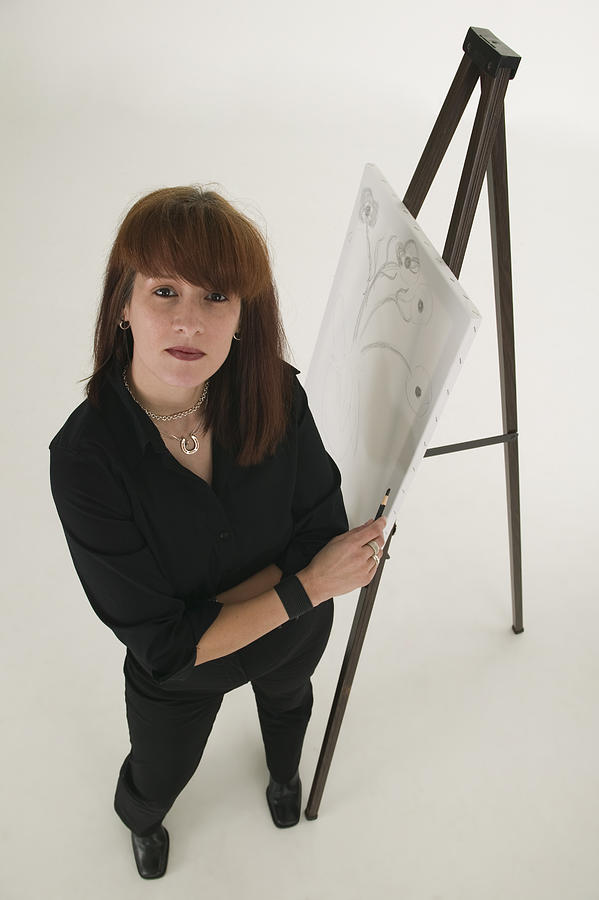 Artist with easel Photograph by Comstock Images