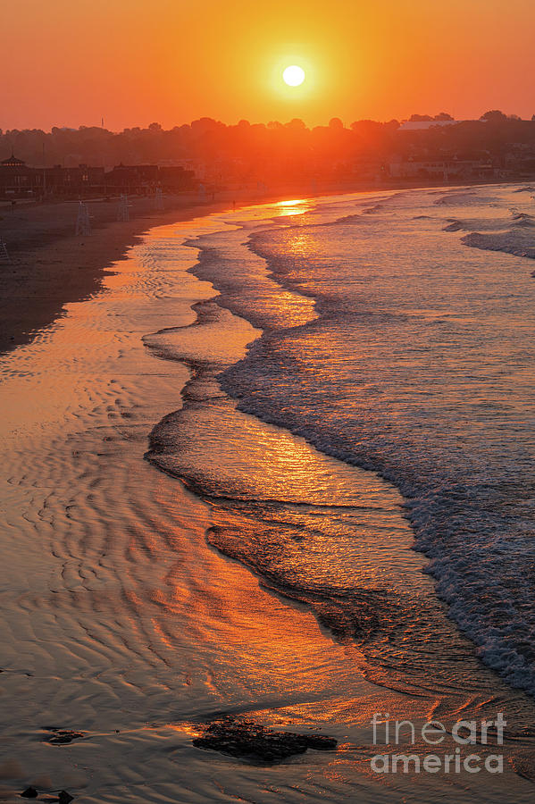 As the Sun Rises over Easton Beach Photograph by Bob Phillips
