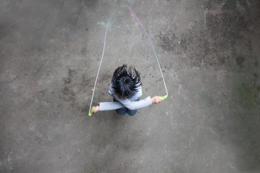 Asian Girl Playing Rope Skipping Photograph by Jxfzsy