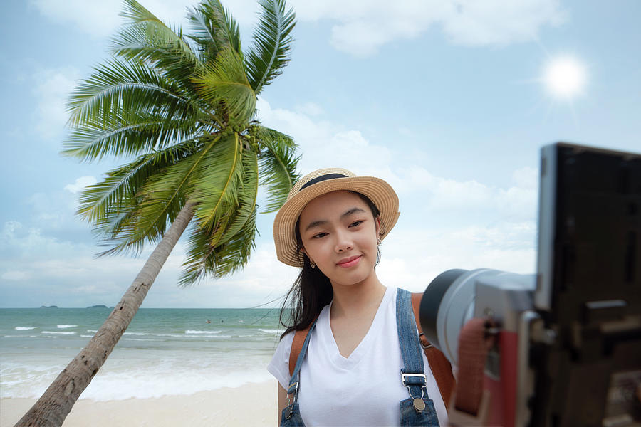 Asian Girl Selfie By Digital Camera With Beach And Coconut Backg Photograph By Anek Suwannaphoom