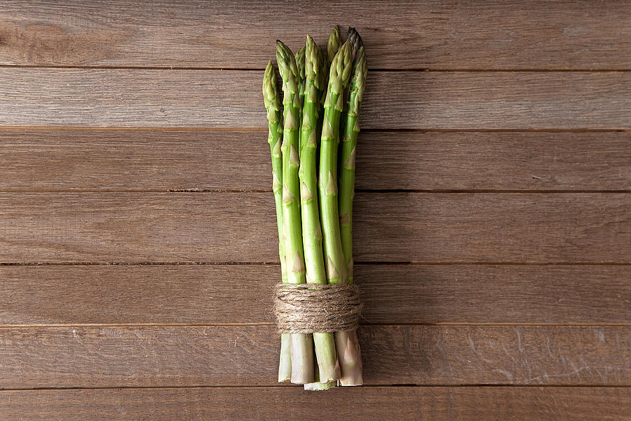 Asparagus in Twine Photograph by Paul Strowger