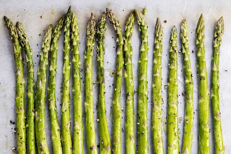 Asparagus Spears on Oven Tray ready for Roasting Photograph by Robynmac
