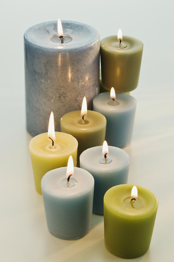 Assorted lit candles Photograph by Tetra Images