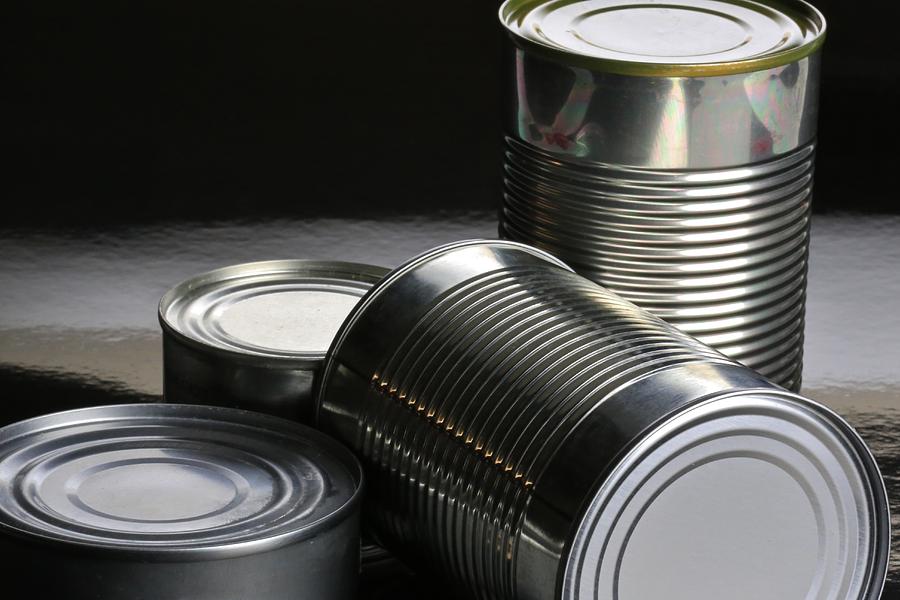 Assortment of tin food cans Photograph by Douglas Sacha