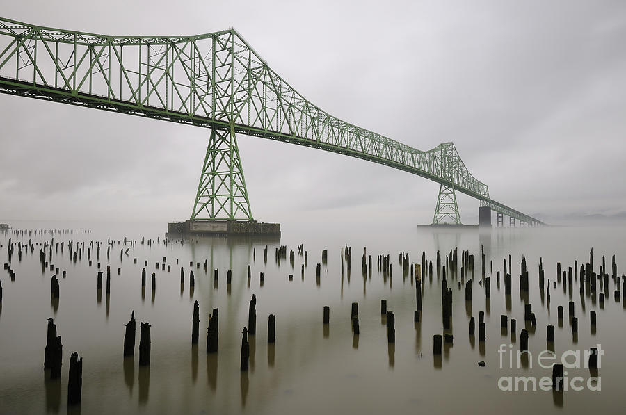 Astoria-Megler Bridge across Columbia River on Foggy Morning Photograph by Tom Schwabel