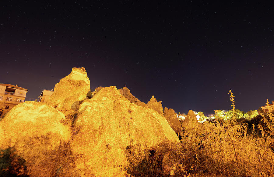 Astro photography of rock formation against starry sky during night in cappadocia, Turkey Photograph by Arpan Bhatia