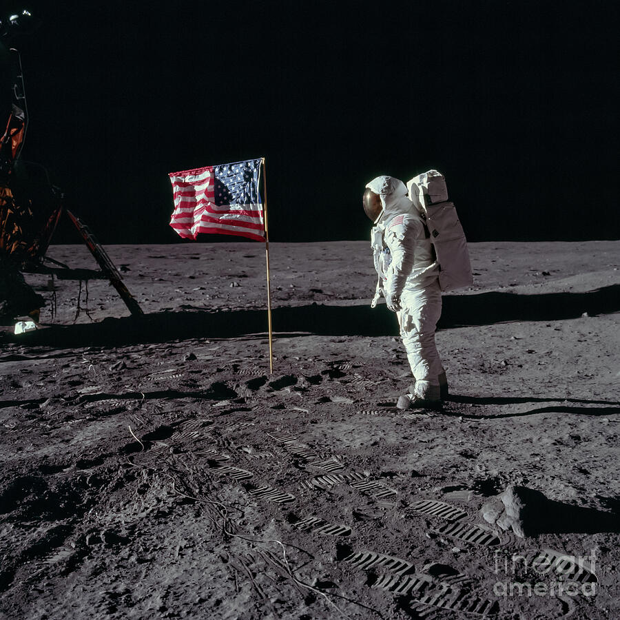 Astronaut Buzz Aldrin and US flag on the moon - Apollo 11 Photograph by Best of NASA