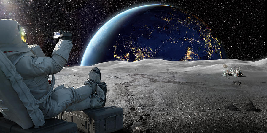 Astronaut Sitting On Moon Recording Sunrise On Earth With Smartphone Photograph by Peepo