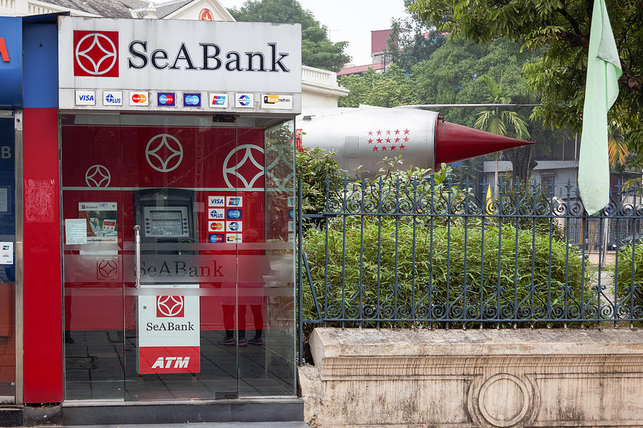 ATM and fighter jet in a Hanoi street Photograph by Carstenbrandt