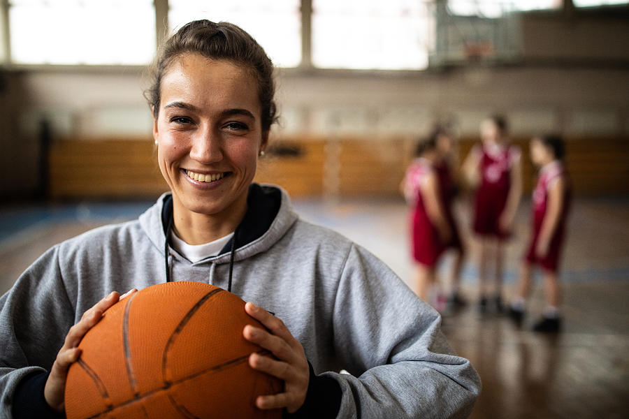 Attractive female basketball coach Photograph by Miodrag Ignjatovic