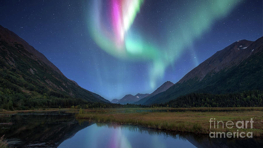 Aurora Borealis Lighting Up The Sky Over The Mountains And A Lak Photograph
