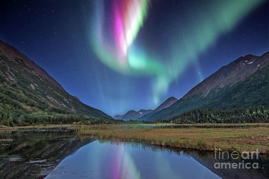 Aurora Borealis Lighting Up The Sky Over The Mountains And A Lake Photograph