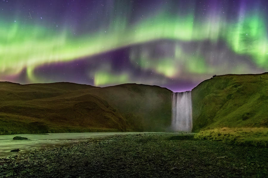 Aurora Borealis over Skogafoss Waterfall in Iceland Photograph by Alexios Ntounas