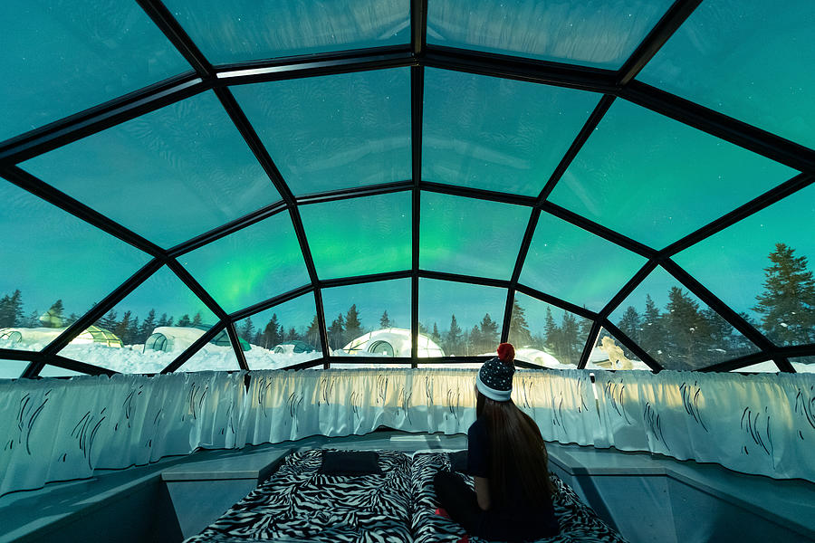 Aurora borealis shining in the night sky seen from Glass Igloos Photograph by Chalermkiat Seedokmai