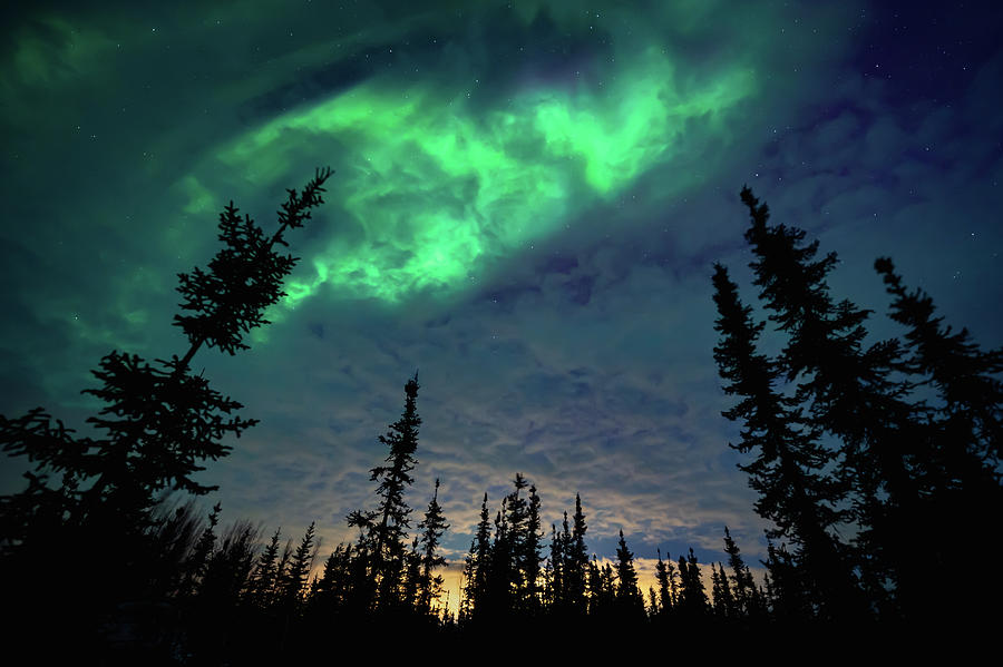 Aurora Peeking Through The Clouds Photograph by William Kennedy