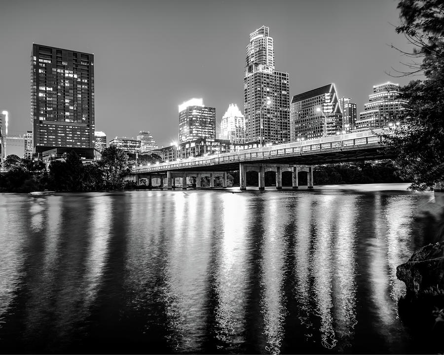 Austin Texas Skyline At Dusk Over The Colorado River - Black and White Photograph by Gregory Ballos