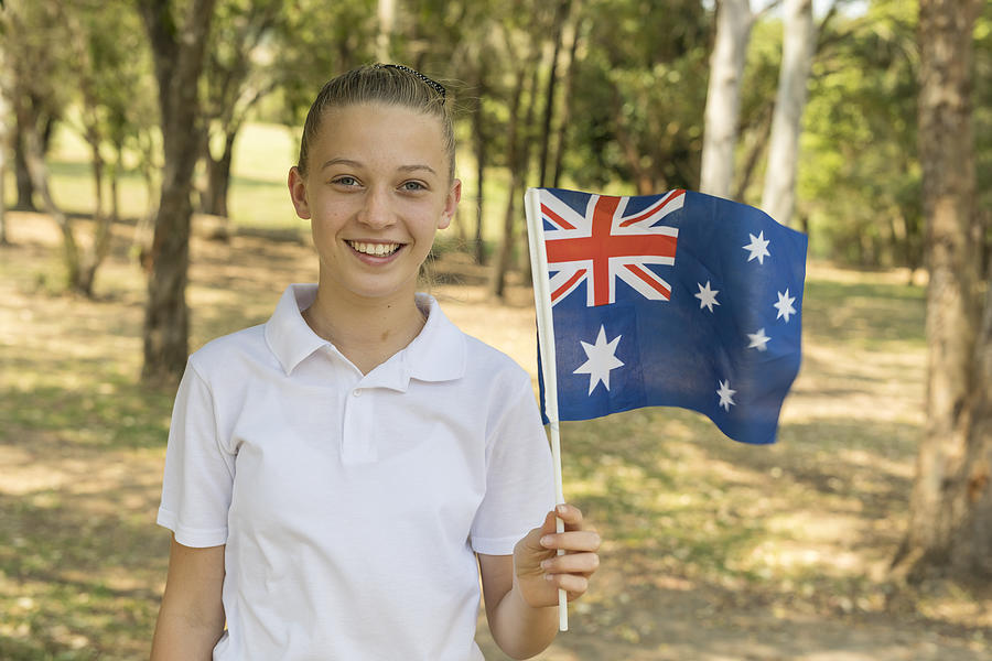 Australian Flag Waving by Junior High School Girl Student for Australia Day Photograph by Davidf