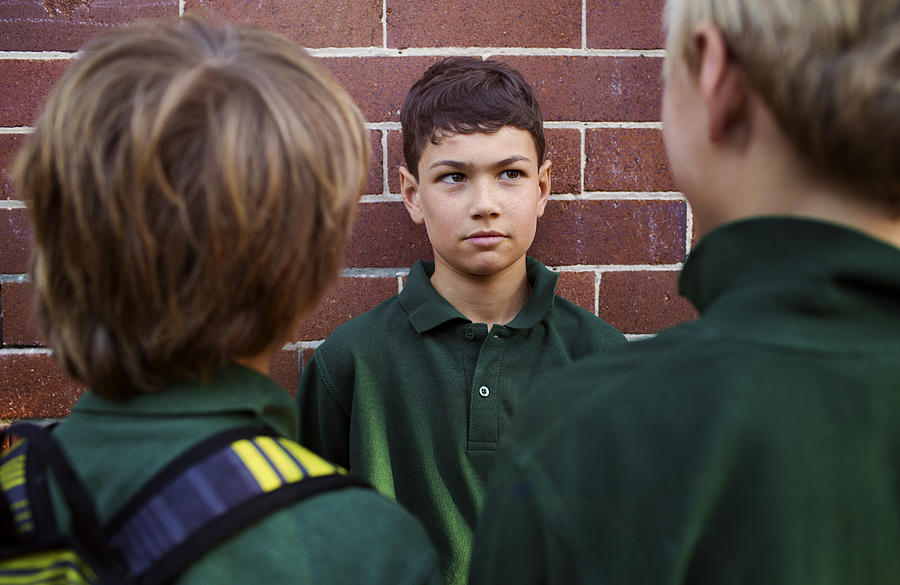 Australian schools boys bullying another student Photograph by Wander Women Collective
