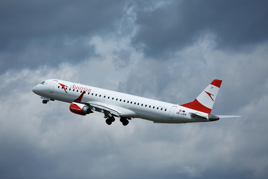 Austrian Airlines taking off Photograph by Ian Middleton