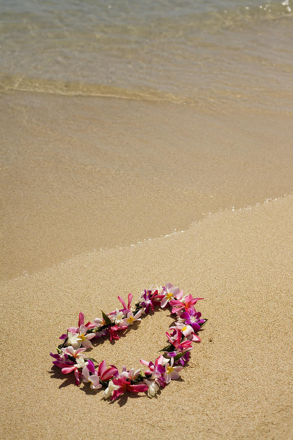Authentic Hawaiian Lei on the Beach Photograph by Ranplett