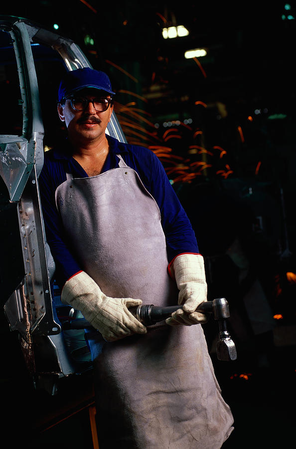 Auto Assembly Line Worker With Wrench Photograph by Juan Silva