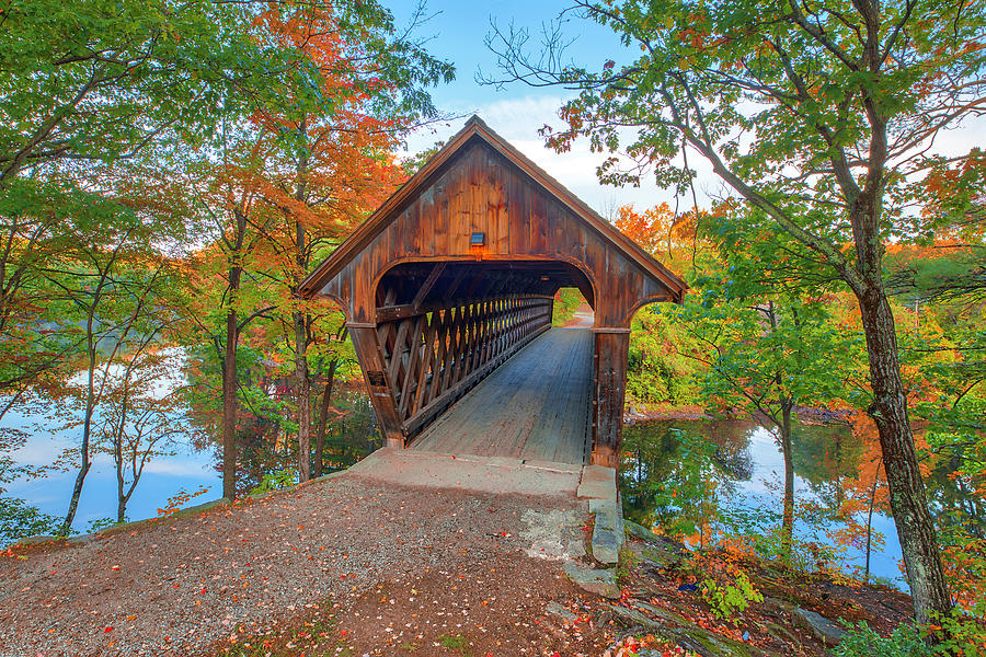 Autumn Colors at Henniker Covered Bridge and Contoocook River Photograph by Juergen Roth