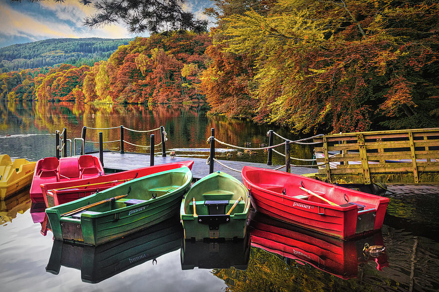 Autumn Rowboats in the Lake Photograph by Debra and Dave Vanderlaan