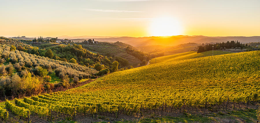 Autumn sunset in the hills of Tuscany Photograph by Georgeclerk