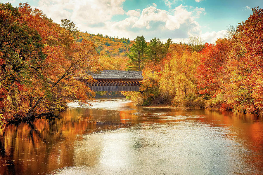 Autumn view of the Henniker Covered Bridge Photograph by Jeff Folger