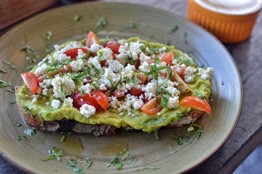 Avocado Toast with feta cheese and cherry tomatoes Photograph by Irina Marwan