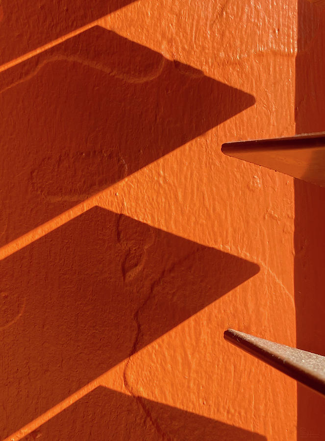 Aztec Shadows #2 - venetian blind shadow at a Mexican restaurant on orange wall Photograph by Peter Herman