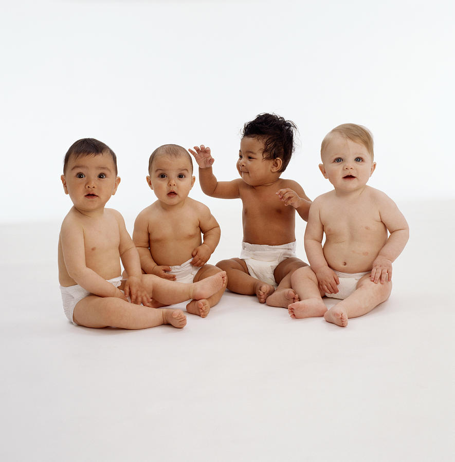 Baby boys and girls (6-12 months) sitting Photograph by Camille Tokerud