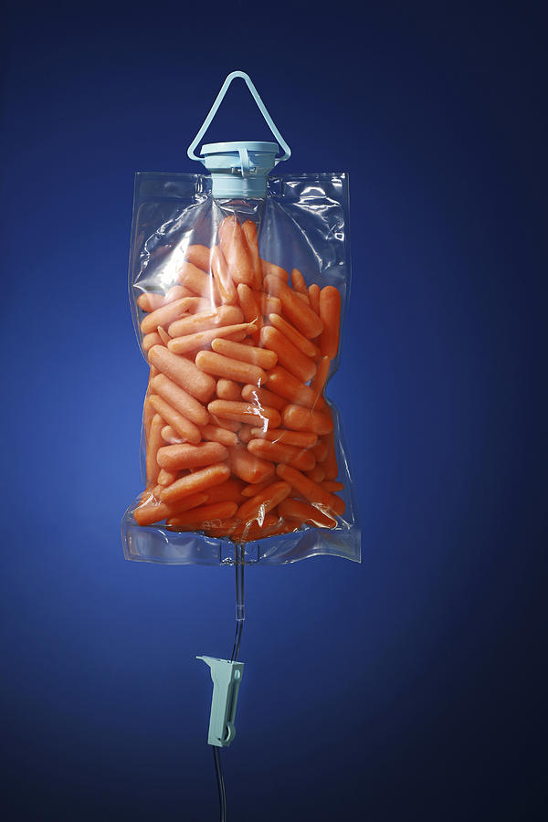 baby carrots in an IV bag Photograph by Sandy Jones