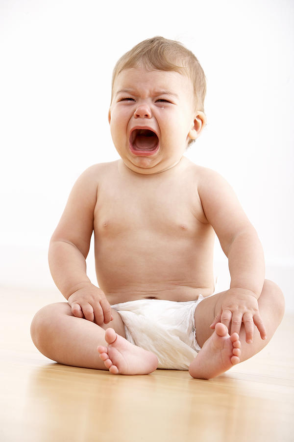 Baby crying Photograph by Adam Gault