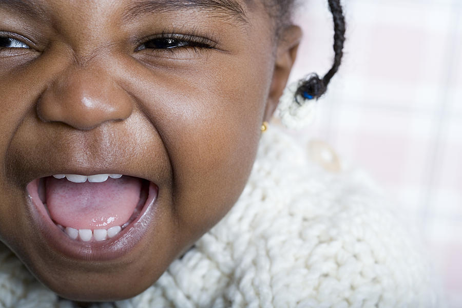 Baby girl laughing Photograph by Image Source
