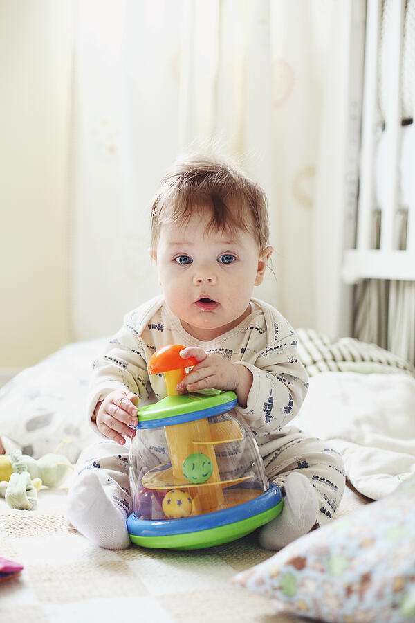 Baby sitting on the floor in his room Photograph by Jurgita.photography Baby sitting on the floor in his room Photograph by Jurgita.photography